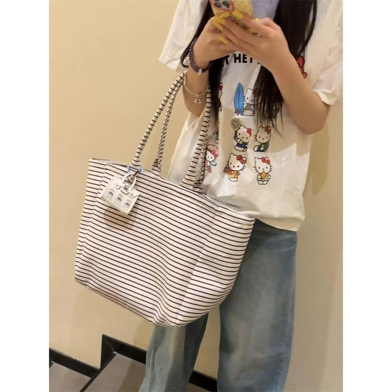 

Early Eight Tong Qin Large Capacity Canvas Tote Bag 2025 New Korean Series Idle Style College Student Shoulder Underarm Bag Black and white Stripes