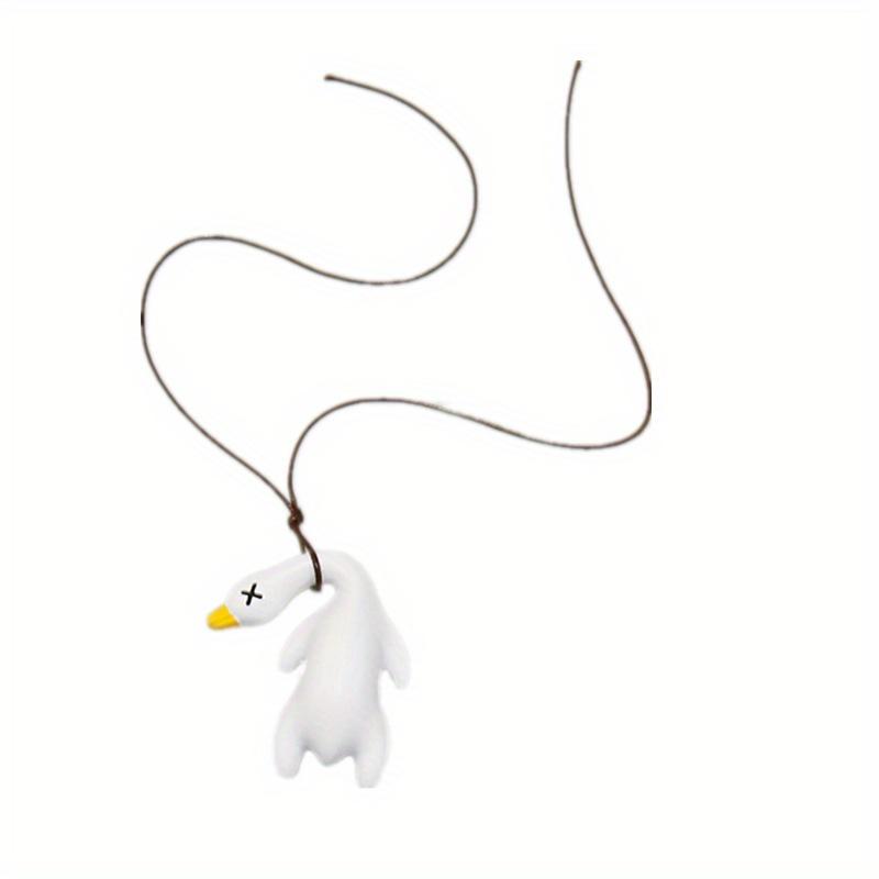 UV-reaktiv anka berlock magisk färgskiftande nyckelring bilprydnad