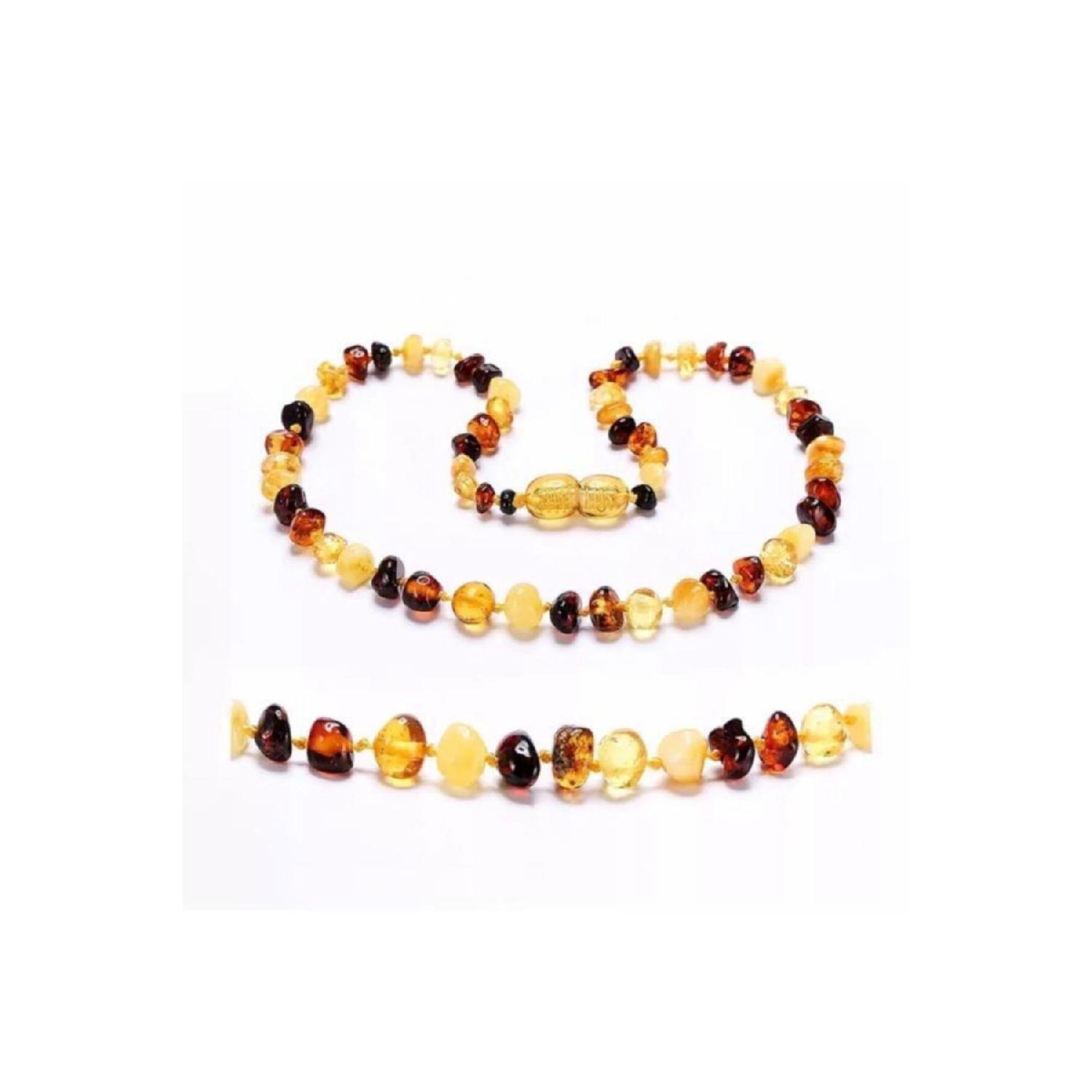 

Сертифицированное колье в виде детских зубов из натурального янтаря