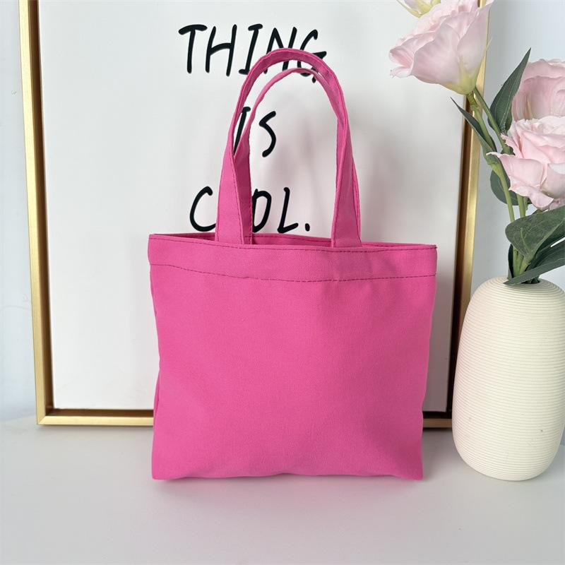 Effenkleurige eenvoudige lunchtas, draagbare canvas tas, kleine stoffen tas, draagbare canvas tas voor het opbergen van diverse spullen