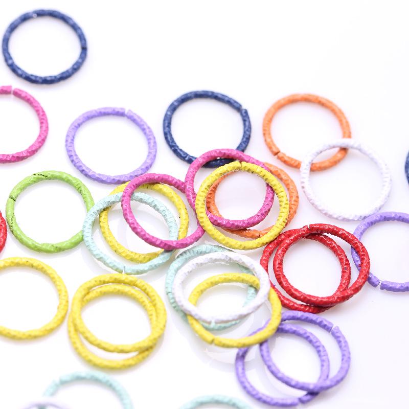 DIY Jewelry Accessories: Colored Baking Paint Embossed Rings (2,000/pack), featuring Round, Open, Single, and Twisted Flower Designs.