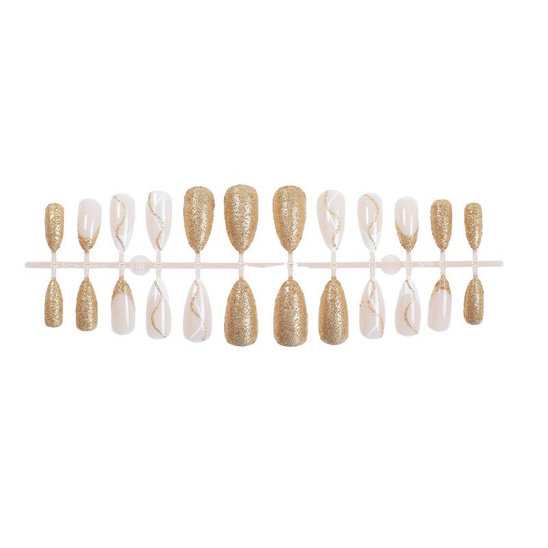 

Европейско-американский золотой глиттерный градиентный пресс-он миндалевидный маникюр с полосатым краем – изысканный носибельный нейл-арт для элегантных женщин Almond