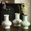 Yusan Ni Modern Ceramic Vase: Elegant Small Fresh Flower Arrangement for Living Room or Hotel Decor.