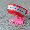 Chattering Teeth Wind-up Toy Clockwork Spring Cartoon Jumping Teeth with Eyes Joke Toy Christmas Goodie Bag Stuffers Kids Adults Gag Gifts