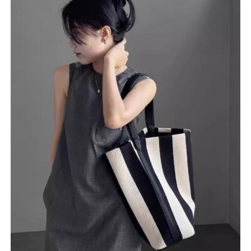

Striped canvas bag bucket bag women s large-capacity niche bag, new shoulder large bag women s bag tote bag