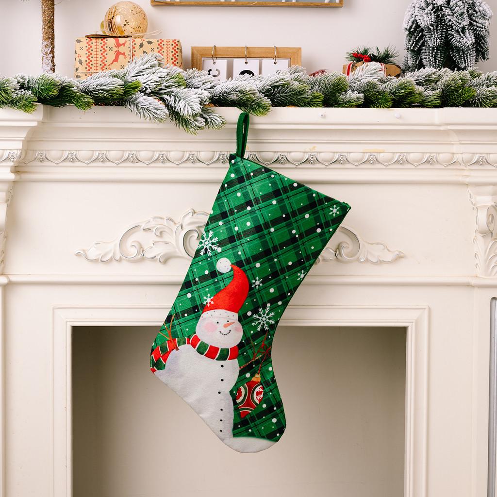 Christmas Playful Stockings In Rich Red And Green Fabric Featuring Snowflakes And Holiday Characters