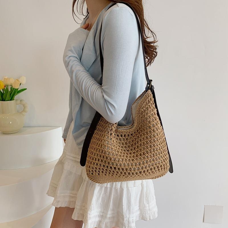 Damentasche neue Mode lässige Strandtasche gewebt tragbar Schulter große Kapazität Hohltasche
