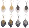 Gold Double-Layer Hollow Leaf Earrings – Simple, Retro, European & American Style