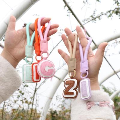 Mode PU-Leder A-Z Buchstaben Schlüsselanhänger Nylon geflochtenes Seil Kurzer Riemen Schlüsselring Damen Herren Anti-Verlust Koffer Rucksack Anhänger Geschenk