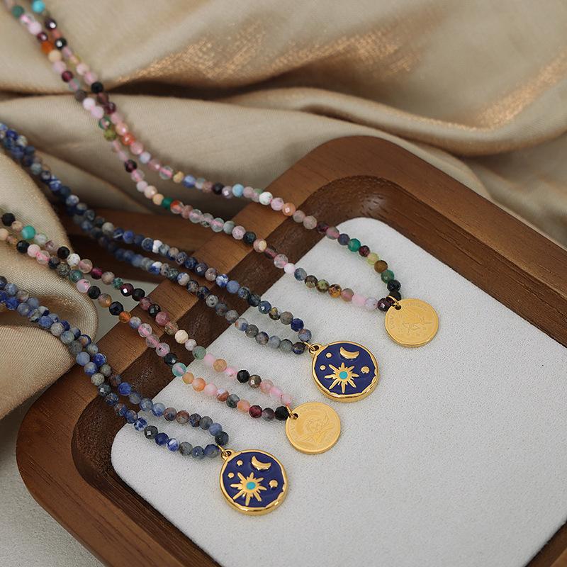 European-American Niche: Blue Spirit Grey Natural Stone Handmade Necklace with Starry Sky Glaze Angel Pendant in Gold-Plated Titanium Steel.