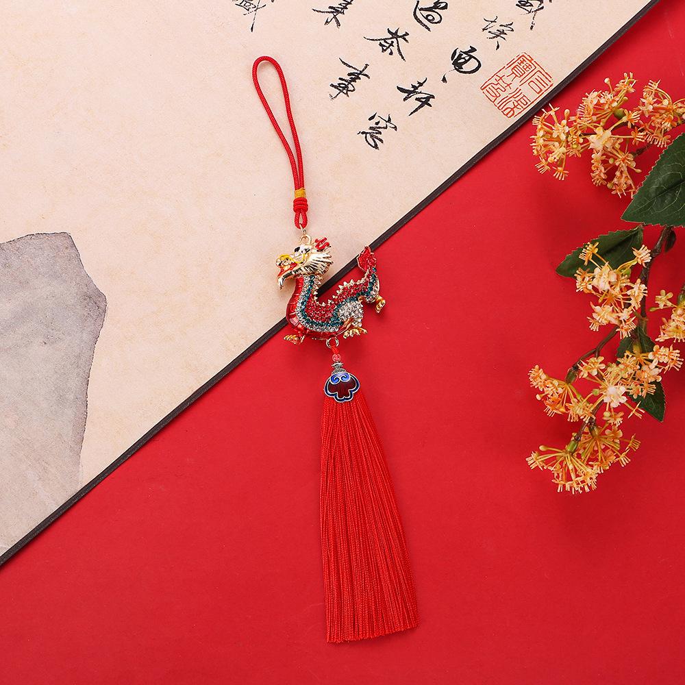 Diamond-Studded Auspicious Dragon Pendant with Red and Gold Tassel