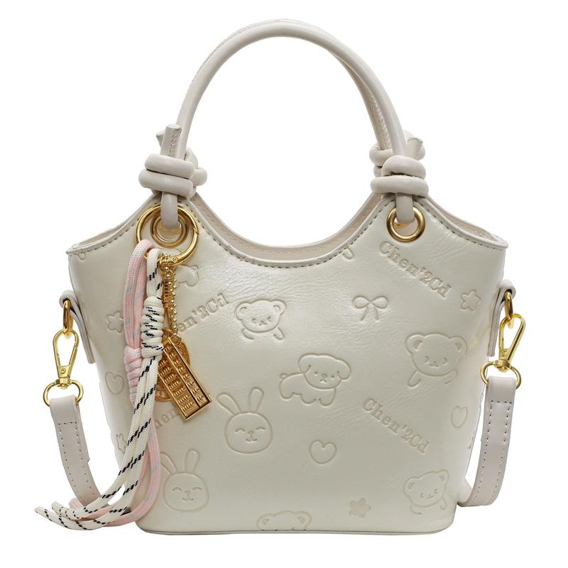 2025 new niche embossed fashion personalized portable bucket bag high-end commuter versatile women's messenger bag