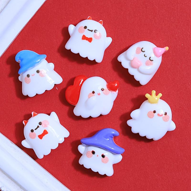 A pack of 12 adorable Halloween ghost resin accessories for DIY hair clips and decorations, including shoe buckles, hat patches,