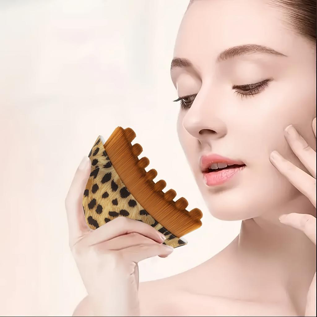 A Crescent-shaped Facial Massage Brush with a Contour-hugging Curve. Its Dual-textured Surface, Featuring Soft Bristles On One Side