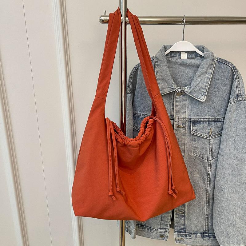 Fashion drawstring canvas bag women's new large-capacity casual shoulder bag college students class universal messenger bag