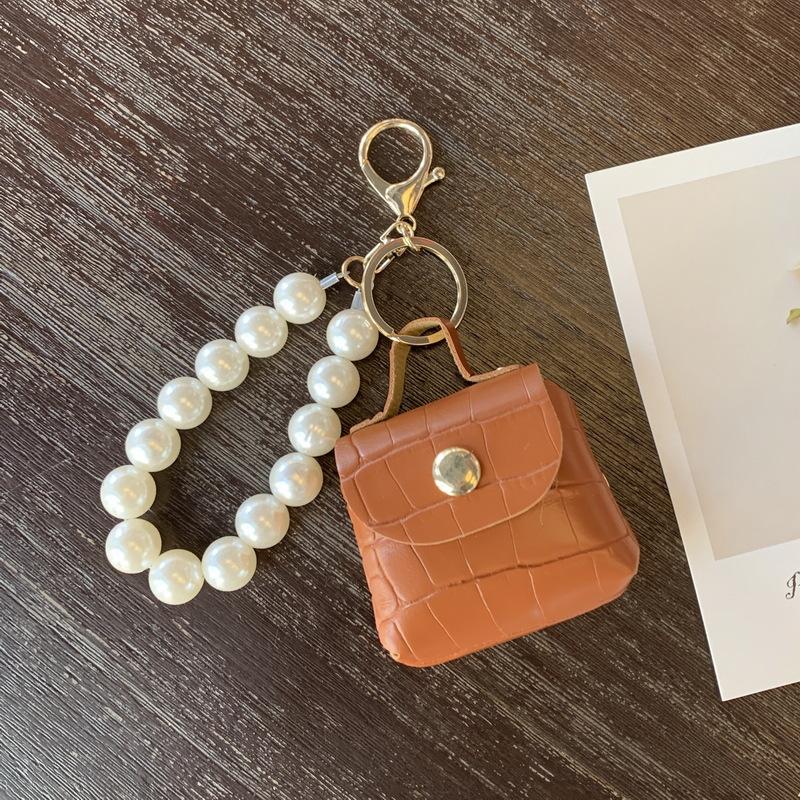 

Pearl bag pendant car keychain handmade mini bag accessories jewelry pu leather d buckle wholesale коричневий