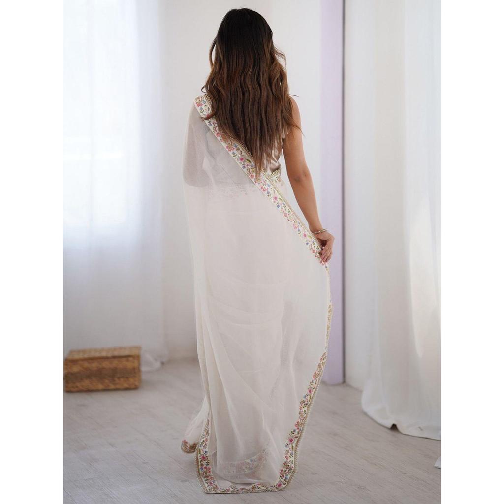 Elegant White Party Wear Georgette Saree with Embroidered Lace Border