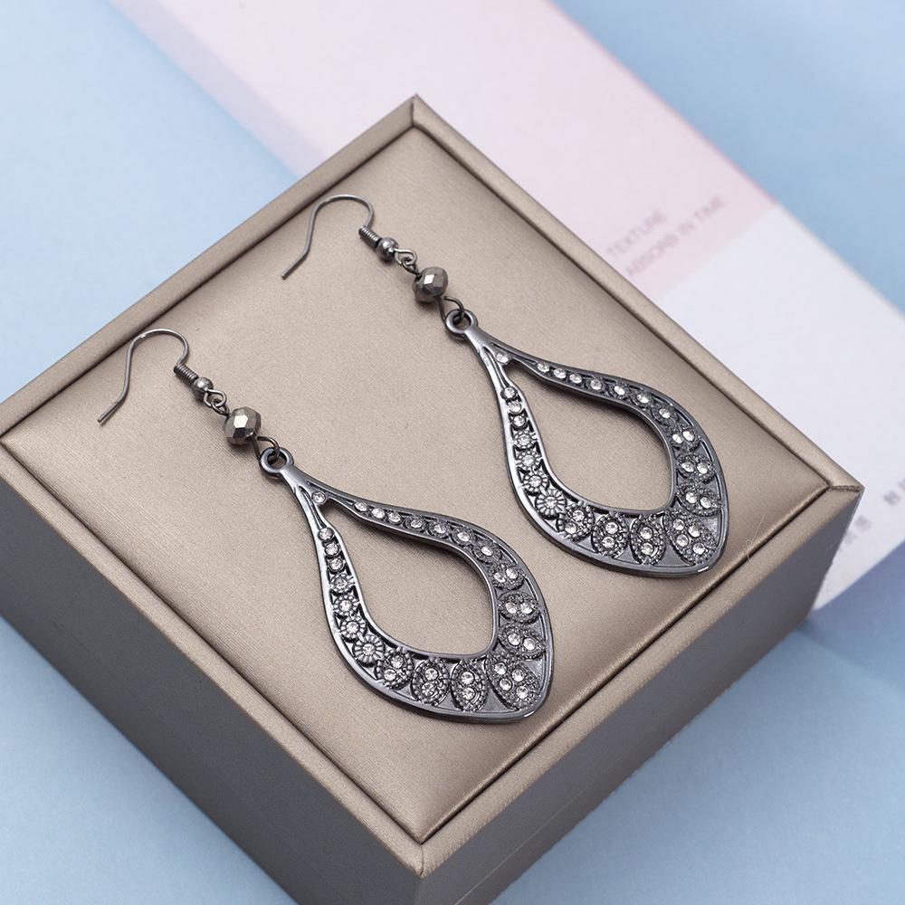 

Модные серьги-подвески в форме ромба с полым узором и инкрустацией бриллиантами из цинкового сплава для женщин