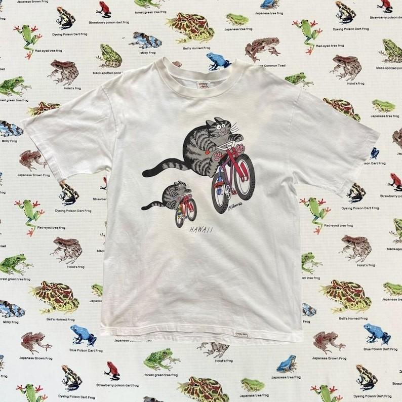 90er Crazy Shirts / B. Kilban Katzen / Katzenmotiv / Fahrrad / Radfahren / Weißes Carto Unisex T-Shirt