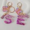 Purple Iridescent Resin Letter Keychain with Butterfly Tassel