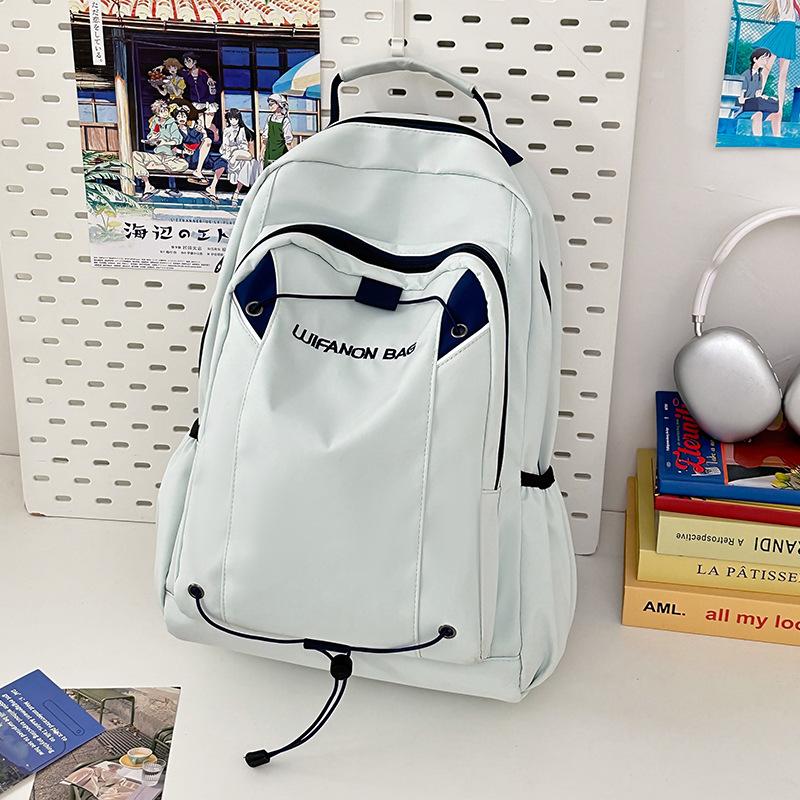 Simple and fashionable student backpack New casual outdoor sports backpack Middle school student large-capacity college style schoolbag