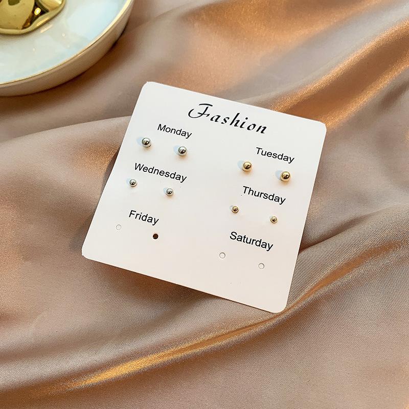 Korean version of small stud earrings one board student cute one week ceramic earrings set plated 911 jewelry pearl stud earrings women