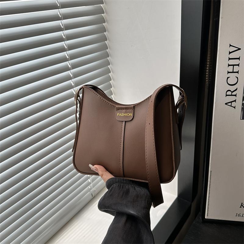 

Versatile fashion small bag women s new feeling shoulder underarm bag splicing texture printed messenger bag bag bag кофейный