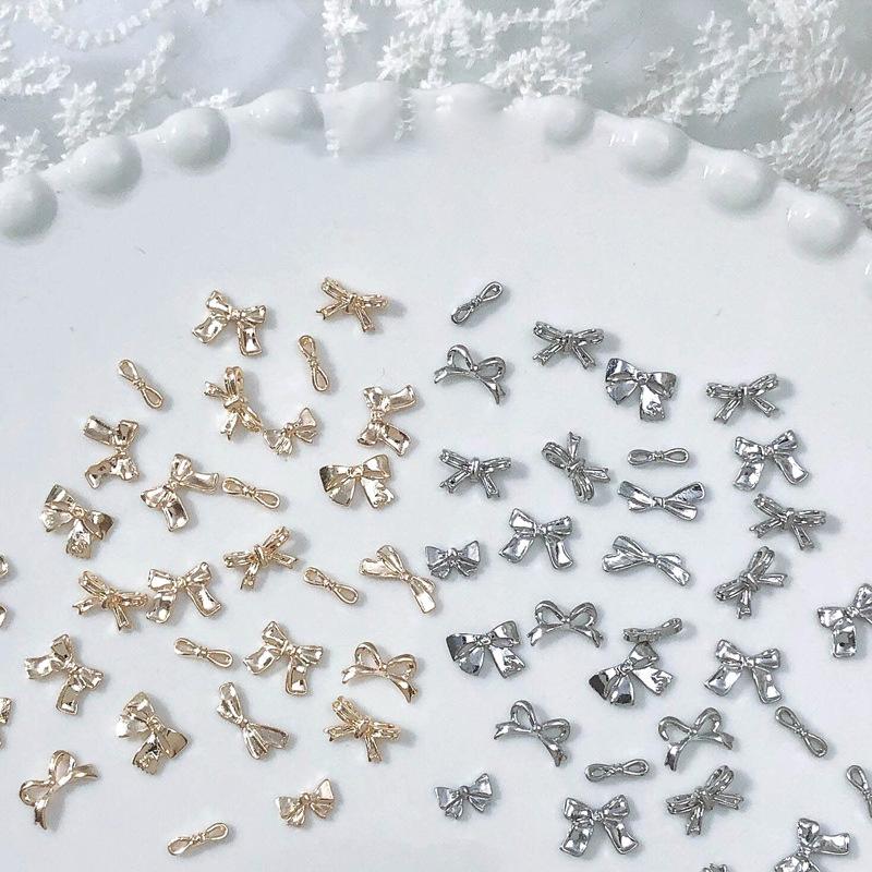50/100Pcs Silver Metal Bows Nail Art Charm 3D Alloy Silver/Gold Bowknot Ribbon Nail Decor Parts Diy Luxury Manicure Accessories