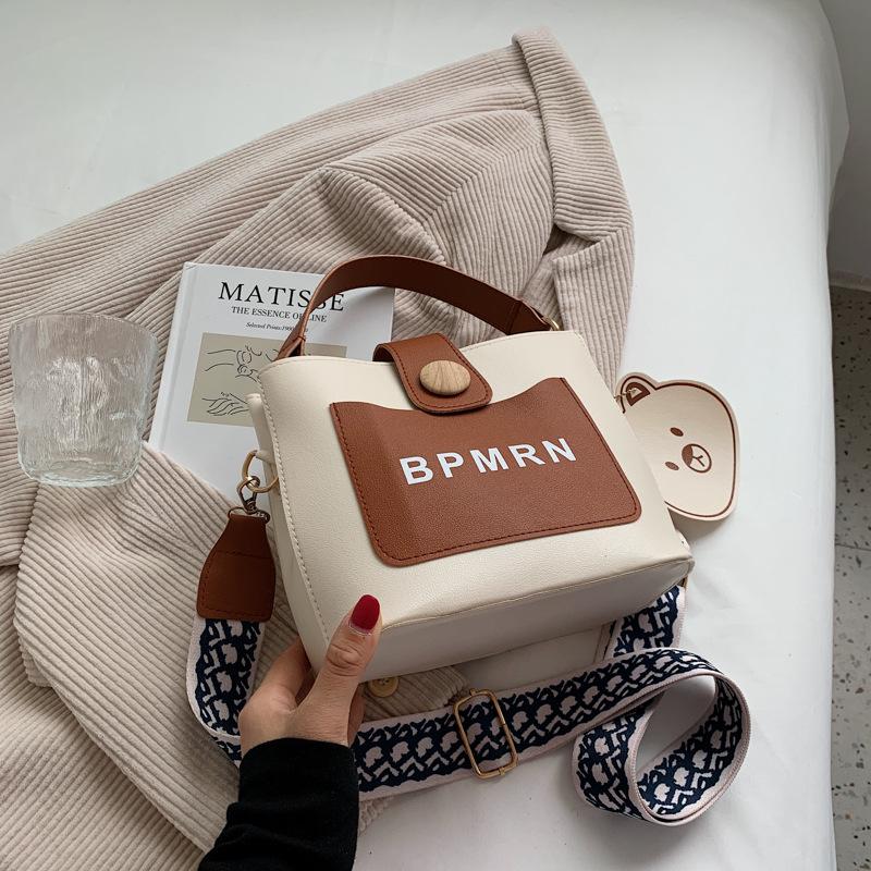 

This year s popular small bag women s autumn 2025 new trendy fashion casual broadband messenger bag shoulder portable bucket bag коричневый