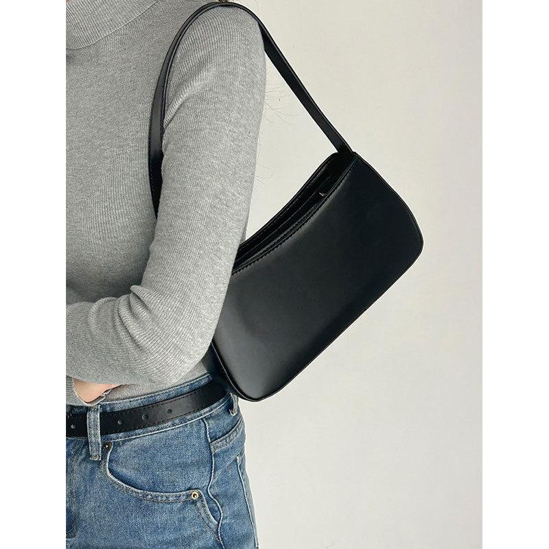 

Bag women s new trendy and versatile handbag, high-end sense texture niche design simple super fire armpit bag чёрный