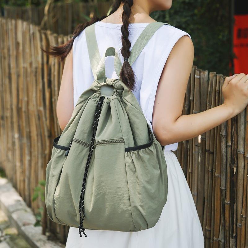 Schoolbag Korean version of nylon cloth niche design schoolbag women's casual lightweight drawstring backpack large capacity versatile simple backpack