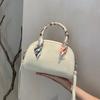Small Niche Design Women's Handbag Hand-held Bowling Bag TOGO Top Layer Cowhide Leather Crossbody Commuting Shoulder