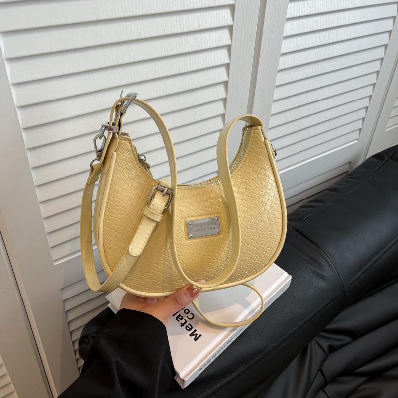 

Niche bag women s new line fashion high sense versatile single shoulder armpit bag crossbody dumpling bag жовтий