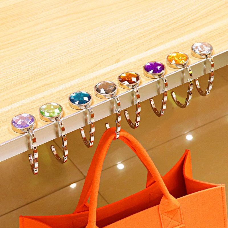 Kreativer Tragbarer Faltbarer Handtaschenhaken - Runder Metallaufhänger und Praktisches Souvenir