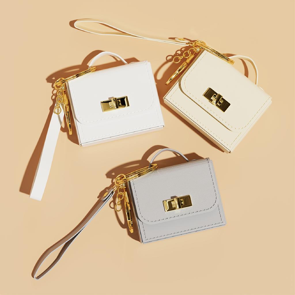 Portachiavi Mini Borsa in Ecopelle PU - Portamonete alla Moda con Dettagli Dorati, Design Compatto per Chiavi e Monete, Disponibile in Azzurro Chiaro, Rosa, Nero