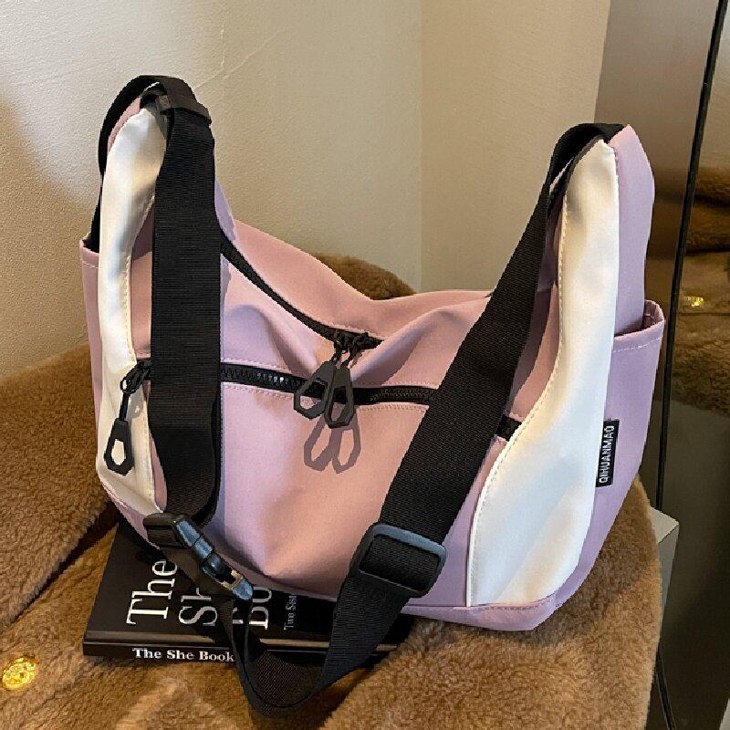 

Niche underarm bag women s new versatile student sports messenger bag commuter shoulder dumpling bag розовый