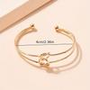 European and American design sense double-layer hollow knotted open bracelet commuter style and flat line hand jewelry