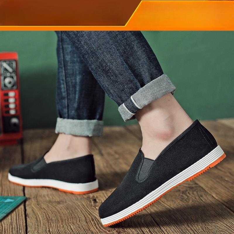 Casual and Breathable Cloth Shoes, A Woman Wearing Work Shoes on One Foot