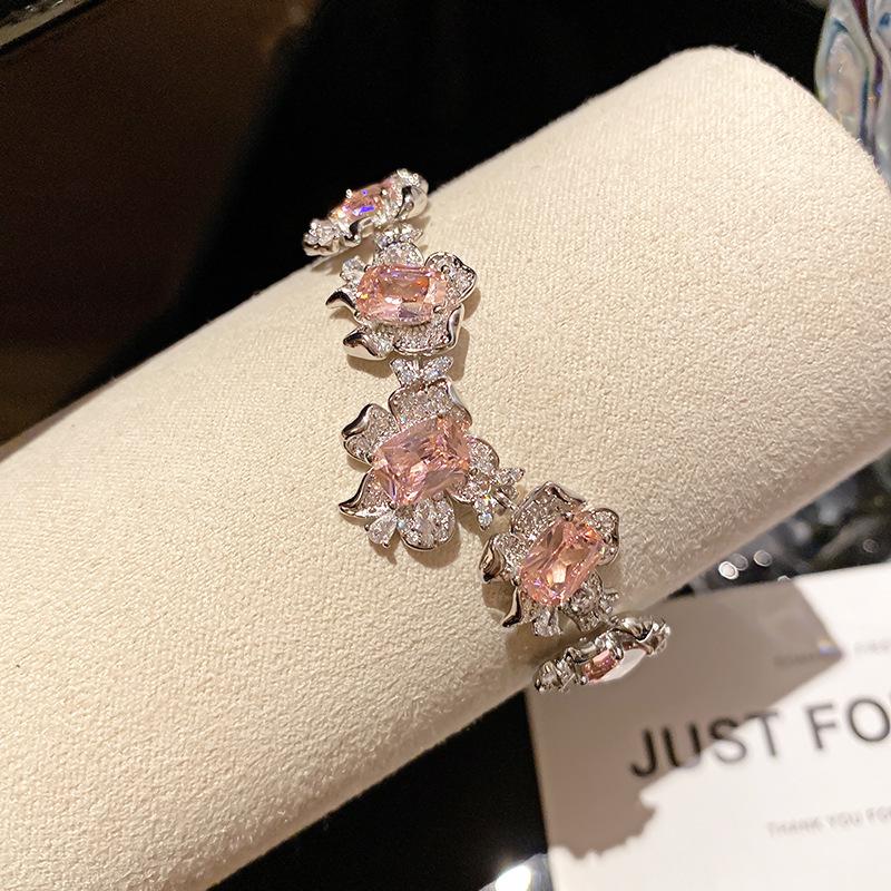 Pink Diamond Zirconia Starburst Flower Bracelet: Trendy, Luxurious Jewelry with Unique Design.