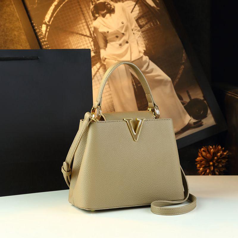 Popular High-grade Leather Women Handbags Small Portable Bucket Bag 2025 New Niche Design Commuter Crossbody Mother Bags