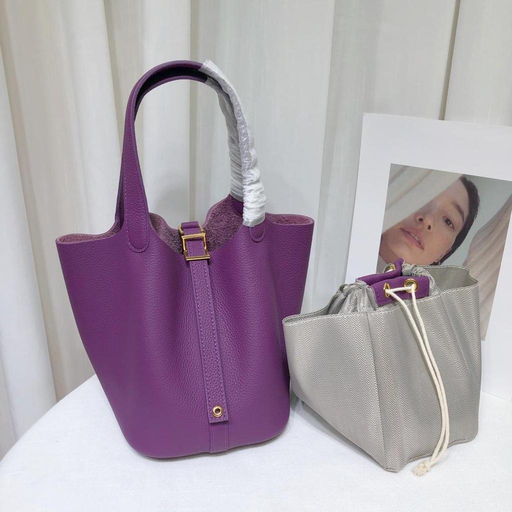 Spot wholesale top layer cowhide vegetable basket bag leather bucket bag commuter fashion lock buckle hand-held handbag woman