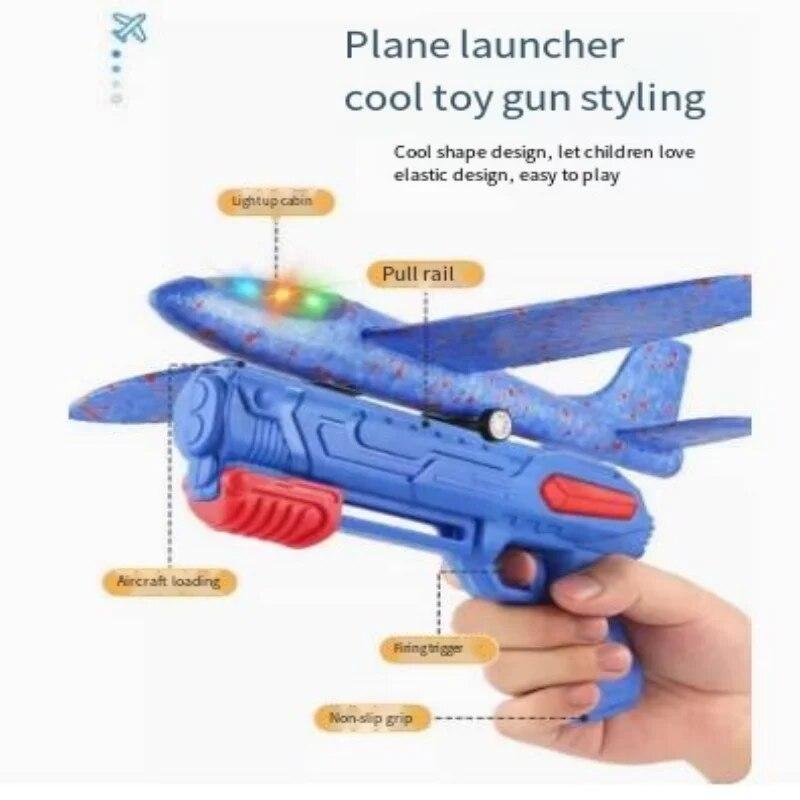 Catapult Foam Plane Gun Fire Outdoor Sports Hand Toss Flying Glider Toy Boys GGirls
