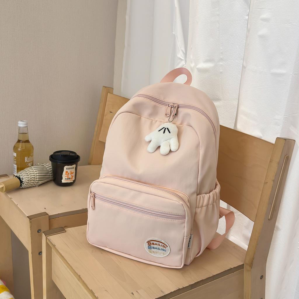 Schoolbag new Japanese simple solid color lightweight casual backpack high value junior high school students large capacity travel backpack