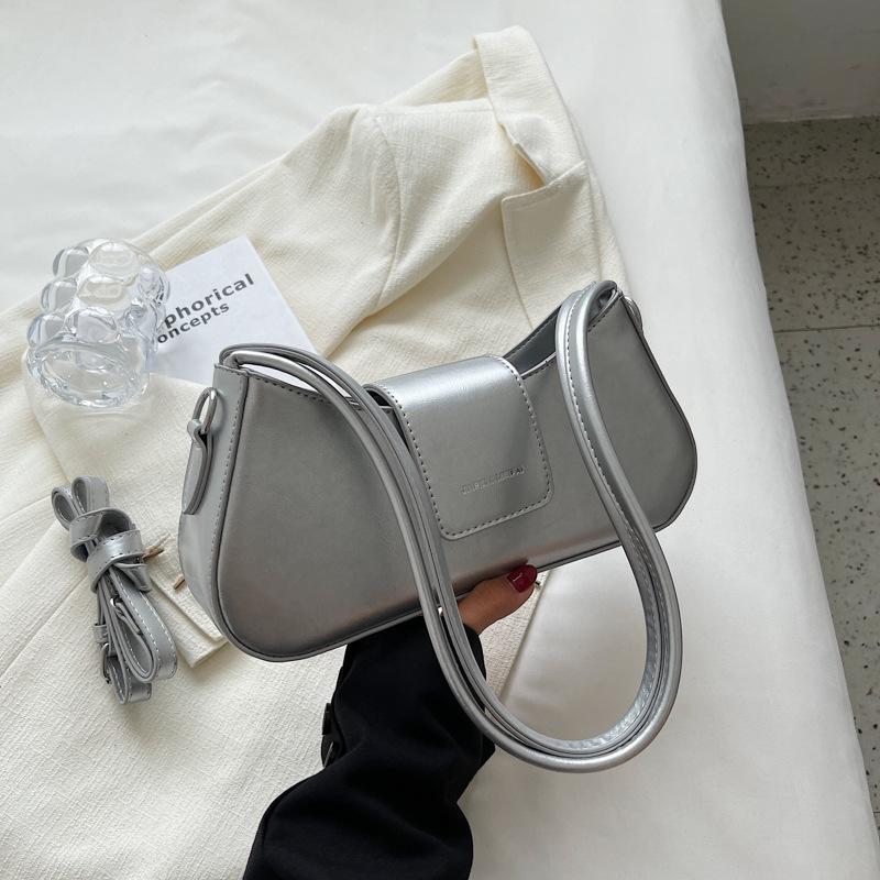 

Korean version of niche small bag women s 2025 new autumn fashion simple ins color crossbody shoulder armpit bag women серебряный