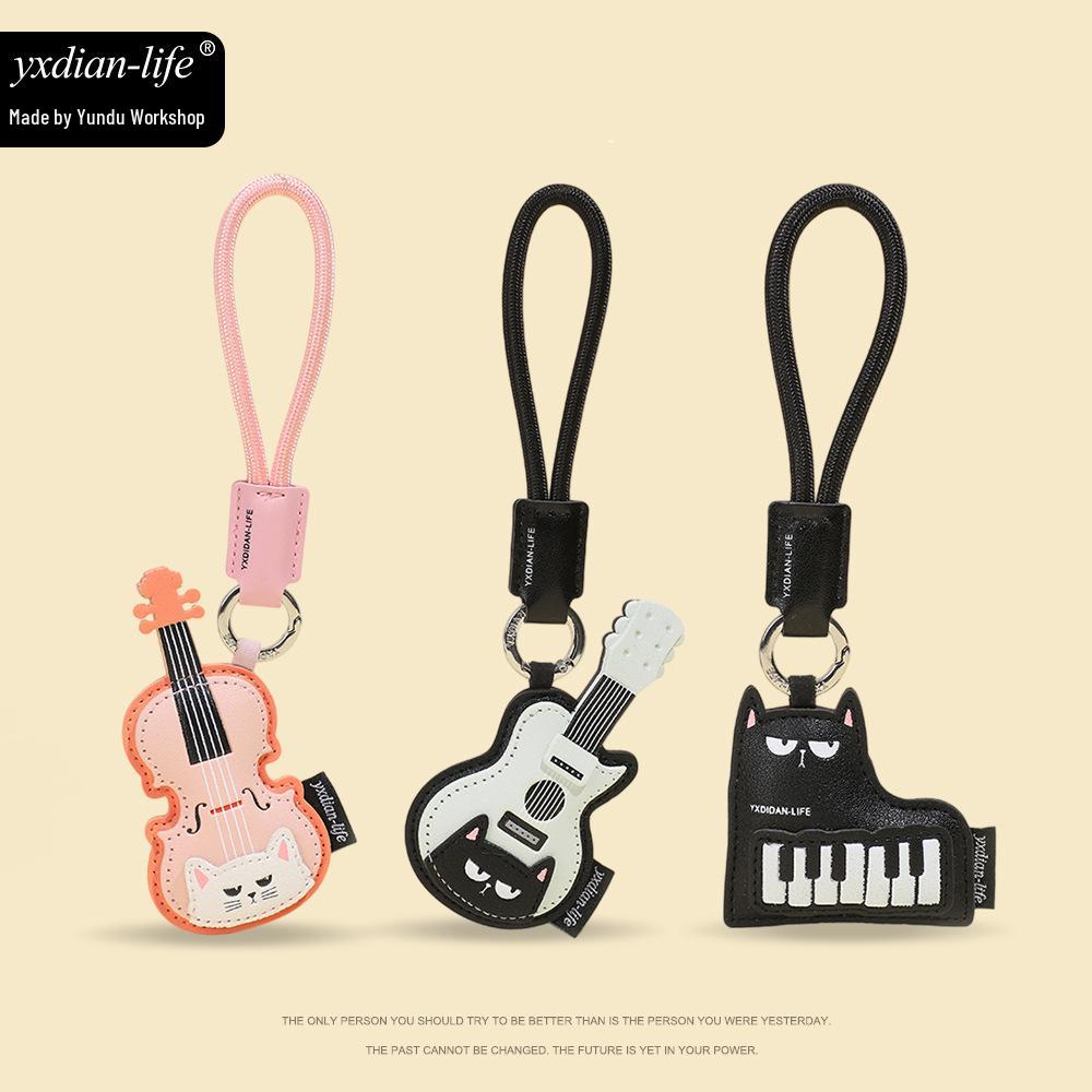 Premium Leather Musical Instrument Keychain: Cat Guitar & Piano Backpack Pendant