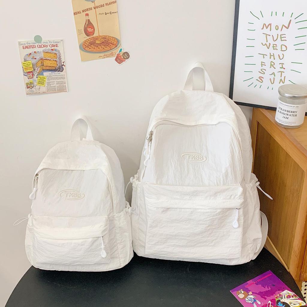 Minimalistischer leichter Rucksack für Damen - Vielseitige Unifarbe für Reisen und Schule (2025)