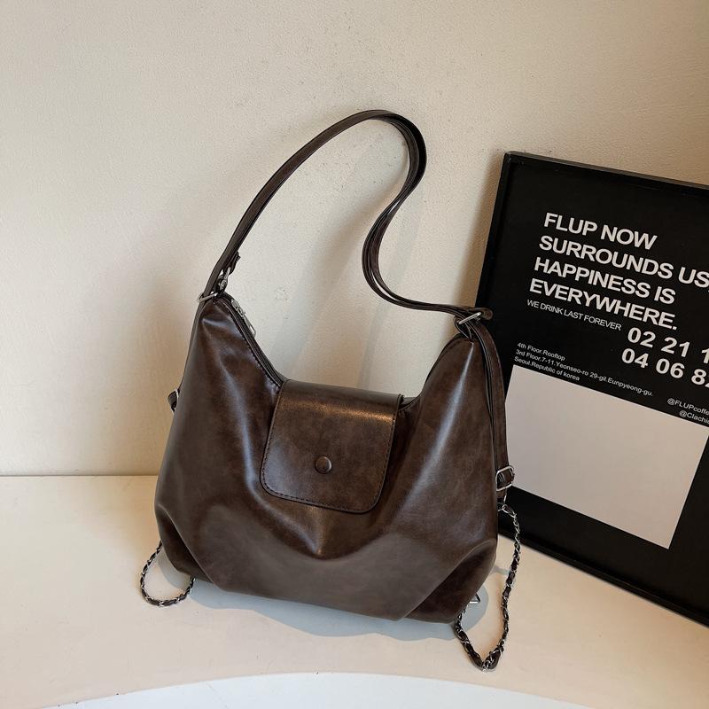 

Многофункциональный рюкзак, промасленный брезент, большая вместимость, повседневный и универсальный, нишевая сумка-тоут, женский для поездок на работу и учебу, на плечо темно-коричневого