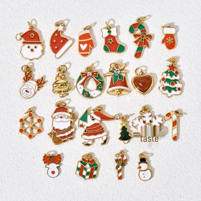 Weihnachts-Schlüsselanhänger aus Edelstahl mit Anhängern von Weihnachtsmann, Schneemann, Glocke und Elch