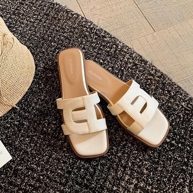 hollowed out and thin square head soft bottom versatile flat bottom one word beach wear leather slippers female summer