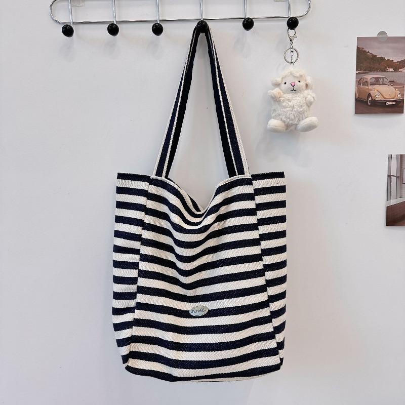 

Двусторонняя холщовая сумка высокой стоимости, новая повседневная сумка-тоут через плечо большой вместимости для通勤